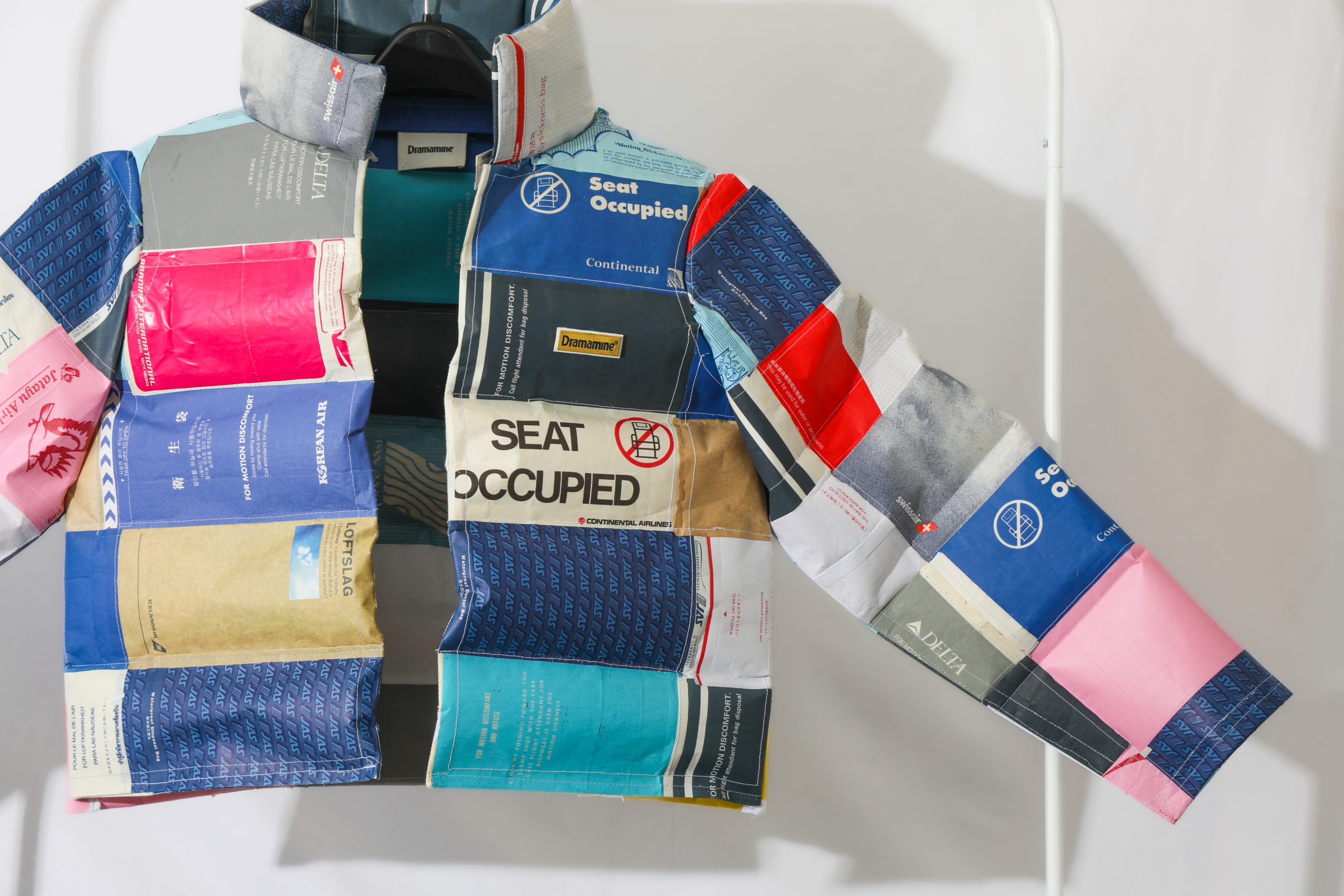 Dramamine and Artist Jessie Bearden Salute the Barf Bag With Puffer Jacket